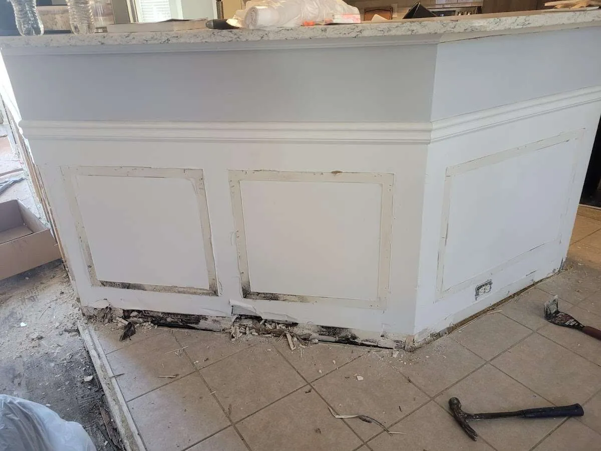 Water damage and mold on kitchen during Storm Damage Restoration in Minot
